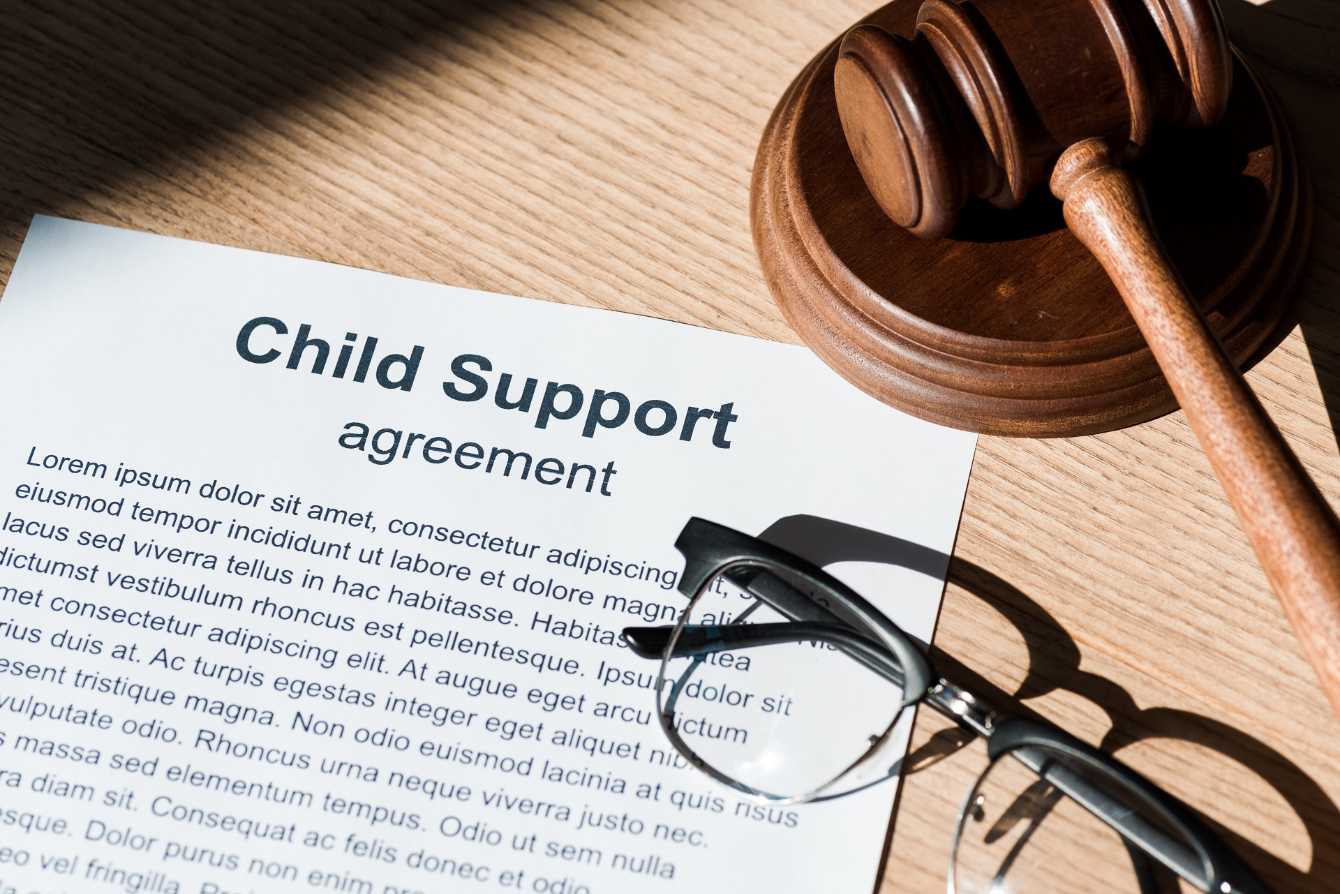 child support agreement and glasses